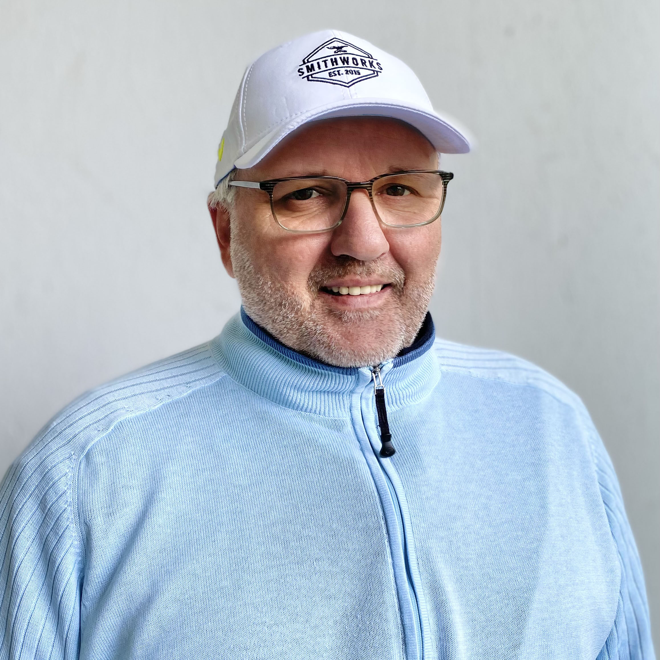 Das Bild zeigt Golftrainer Frank Hollbach